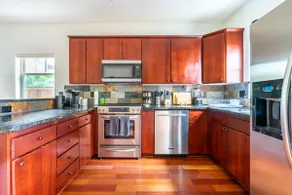Modern 2BR Oasis: WFH, Central with Parking - Image 5