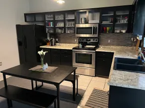 8 min from WEC! Adorable 2BR home with pool - Image 4