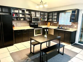 8 min from WEC! Adorable 2BR home with pool - Image 3