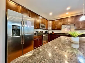 Executive corporate rental features community pool - Image 4