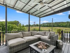 Beautiful Waterfront Home with abundant outdoor seating, pool, hot tub, grill - Image 4