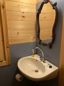 Tiny house on the first floor of the hayloft. - Image 5