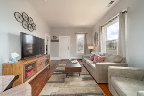 Updated Downtown Bungalow Centrally Located - Image 3