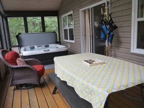 Private cabin with hot tub and gazebo at Rock Lake - Image 4