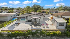 Luxury family friendly WATERFRONT home with a POOL, PLAYGROUND, FIREPIT & BEACH  - Image 3