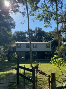 \"High On The River\" a quaint cabin resting along the upper Steinhatchee River. - Image 5