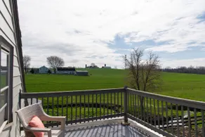 Amish farmhouse by the creek - Image 2
