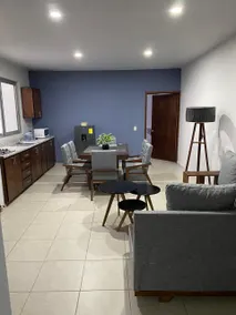 Luxurious Apartment #1 with a living room, dining room, and garage - Image 5