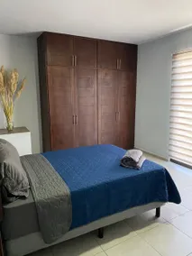 Luxurious Apartment #1 with a living room, dining room, and garage - Image 3