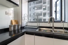 Luxurious 2BR Central Oasis w/ Pool, Gym & Views - Image 5