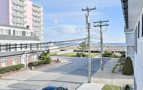 Beach block - boardwalk, ocean views, steps to the beach. - Image 2