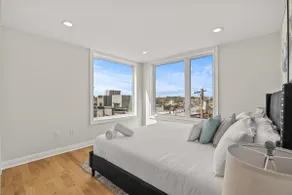Modern 2BR with Private Rooftop and Skyline Views - Image 3