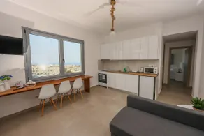 Aerial | One-Bedroom Apartment with City View - Image 2
