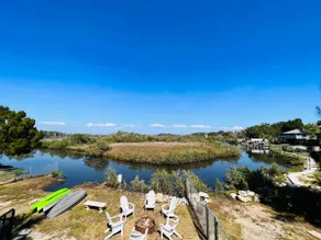 Stilt 2BR Canal Home | Waterfront Retreat - Image 2