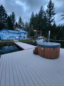 Rustic cabin with hot tub and sauna on the lake - Image 3