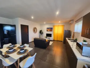 Modern sunshine yellow apartment with nature views - Image 4