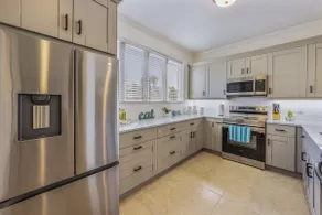 Private townhome steps from the beach and right next to the pool - Image 3