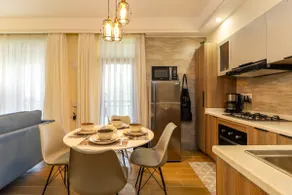 Gorgeous 2BR Central Gem w/ Rooftop, Gym & Pool - Image 5