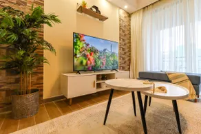Gorgeous 2BR Central Gem w/ Rooftop, Gym & Pool - Image 2