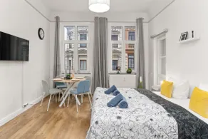 homey Apartments - Neighborhood: In the middle of the action! - Image 3