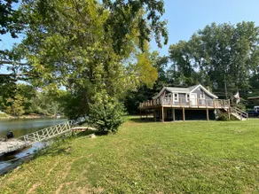 Riverfront Oasis with Massive Deck - Image 3