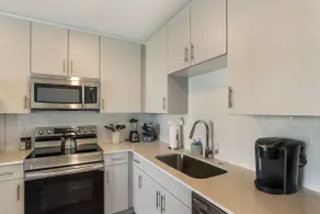 Downtown Oasis: Poolside Condo, Patio & Gym - Image 4