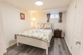 Private 2 bedrooms, 2 bathrooms, dedicated free parking, huge basement - Image 4