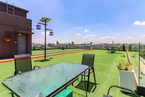 Elegant 2BR Central Haven w/ Pool, Gym & Rooftop - Image 5