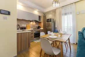 Elegant 2BR Central Haven w/ Pool, Gym & Rooftop - Image 3