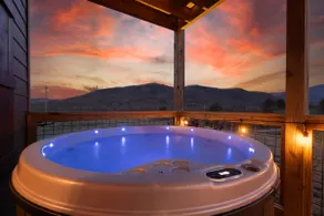 View of Mt Guyot · Hot tub · Fire pit · Pool Table - Image 5