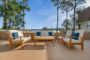 Beautiful bay front home with hot tub! Sleeps 18+ - Image 2