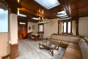 ”Saffron” Luxurious Teak Wood Themed Penthouse - Image 3