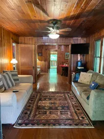 Rustic Cabin Tucked in Woods - Image 2