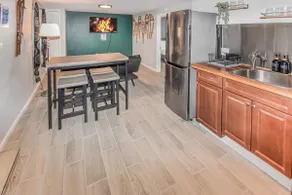 Cozy basement space with 2 bedrooms and kitchenette - Image 5