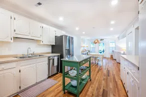 Huge porch with lagoon views - Walk to the Beach - Image 5