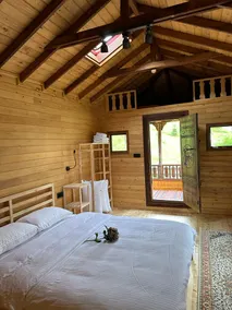 Stone & Wood House in Nature (Nero House) - Image 2