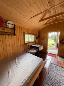 Intimate cabin with lean-to. - Image 3
