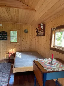 Intimate cabin with lean-to. - Image 4
