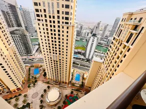 Downstairs is JBR Beach, the world's largest Ferris wheel, and Dubai Marina, 2-bedroom bay view apartment, 6 people - Image 4