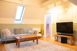 Bright Top-Floor 1BR | Deck, Walkable, Skylit Bath - Image 4