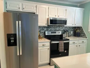 Clean and Cozy Condo - Image 5