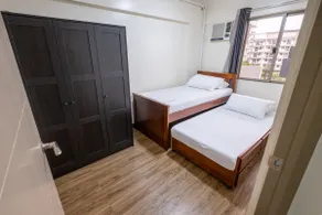 Modern 2BR Condo | Fully Airconditioned w/ Parking - Image 2