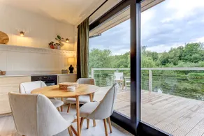 Lakefront cabin with boat and countryside - Image 5