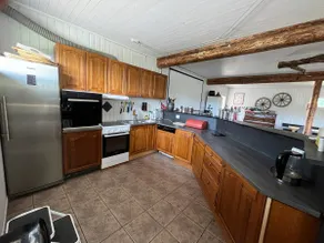 Nice cabin in the woods near water with canoe - Image 4