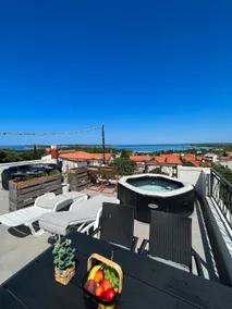 Sunset Bliss: Seaview Penthouse + Rooftop Jacuzzi - Image 5