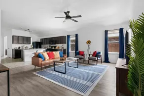 Modern Comfort Near Airport & Tesla w/ Workspaces - Image 2