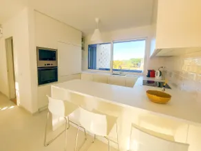 Elegant 2BR Apartment with Pool & Garden - Image 4