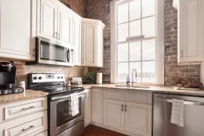 Downtown Riverfront Condo With Industrial Accents - Image 4