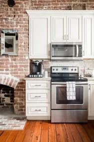 Downtown Riverfront Condo With Industrial Accents - Image 5