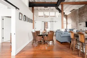 Downtown Riverfront Condo With Industrial Accents - Image 2